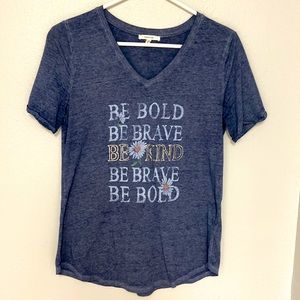 V-neck graphic shirt “Be Bold Be Brave Be Kind Be Brave Be Bold”